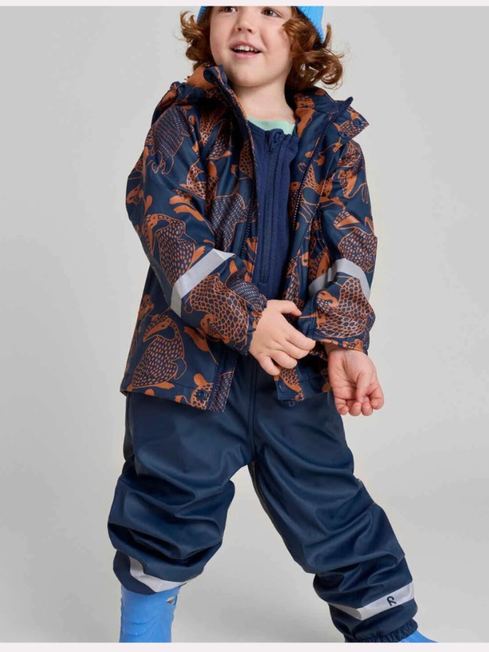 Reima Kids Fleece Lined Waterproof Rain Jacket - Navy - Badger Print - Size 7Y